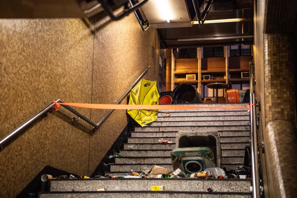 Garbage and debris lie at a blockaded entrance to Sheung Wan MTR station on November 2. Photo: Bloomberg