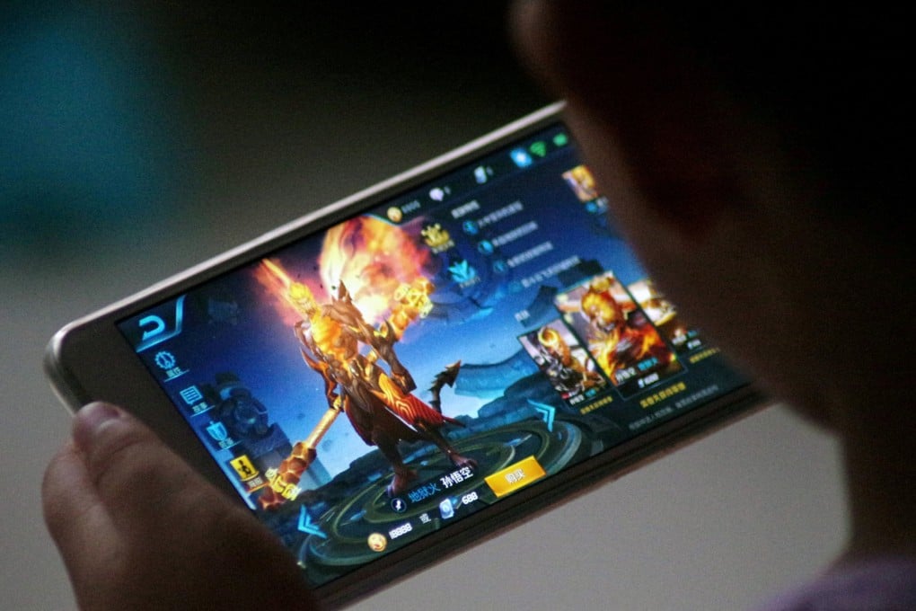 China has extended restrictions on minors playing video games, aimed at reducing gaming addiction, to mobile titles. Photo: Reuters