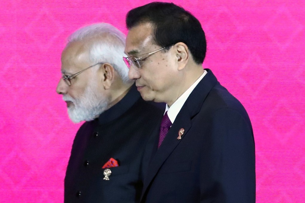 India’s Prime Minister Narendra Modi and Chinese Premier Li Keqiang at the RCEP summit in Bangkok, Thailand. Photo: Reuters