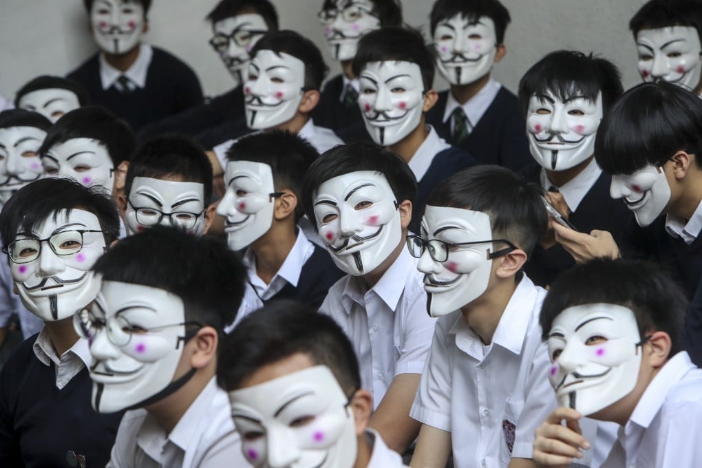 Students hold a sit-in at Ying Wa College, one of several pupil protests held across the city on Tuesday. Photo: Winson Wong