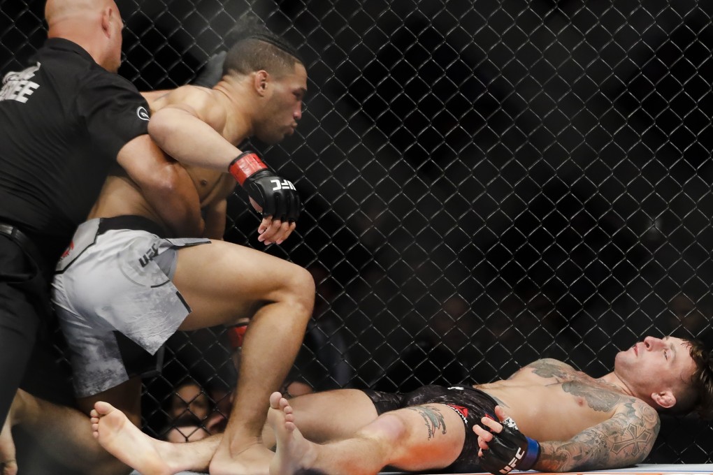The referee steps in after Kevin Lee knocks out Gregor Gillespie during the first round at UFC 244. Photo: AP