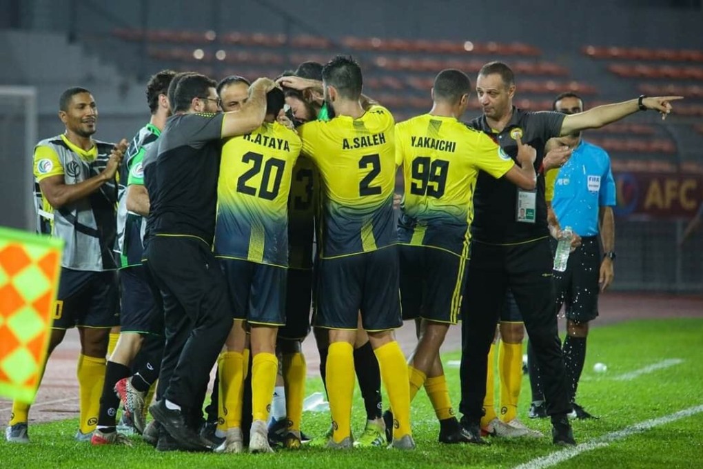 Al Ahed players and coaches celebrate the goal in their 1-0 victory over April 25 in the AFC Cup Final in Kuala Lumpur. Photo: Twitter/Al Ahed FC