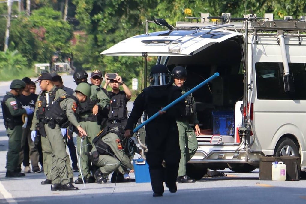 Members of a bomb squad inspect the site of an attack by suspected Muslim militants in Thailand’s Yala province on November 6. Photo: AFP