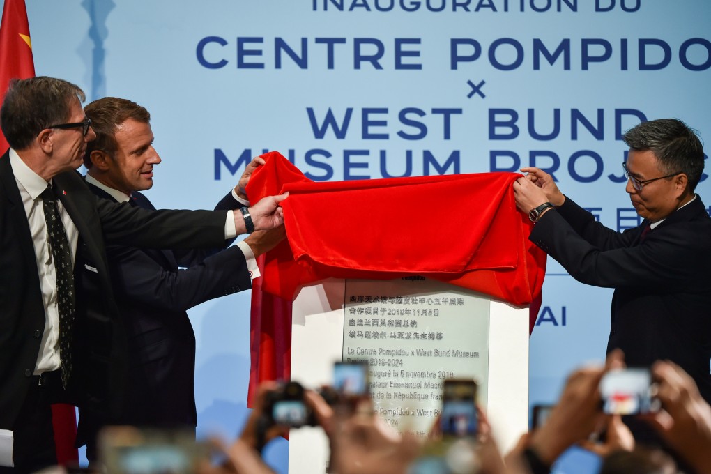 A plaque is unveiled at the museum by (from left) Pompidou Centre president Serge Lasvignes, French President Emmanuel Macron, and Fang Shizhong, director of Shanghai’s Xuhui district. Photo: Reuters