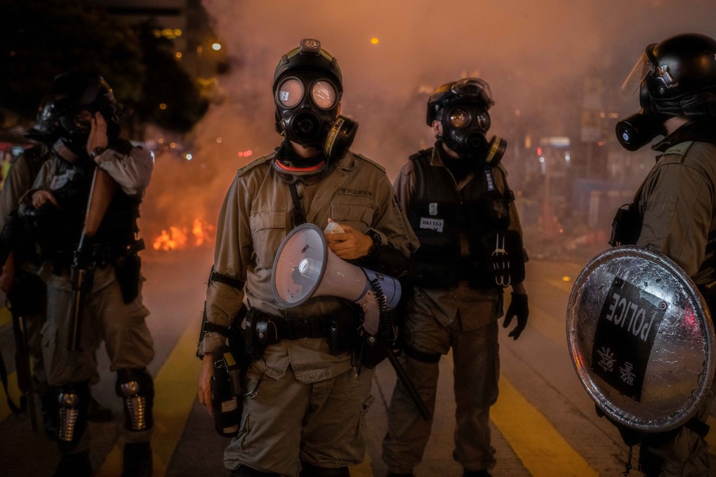 Hong Kong riot police wear protective masks during a protest rally on November 2. Photo: Ivan Abreu/SOPA Images via ZUMA Wire/dpa