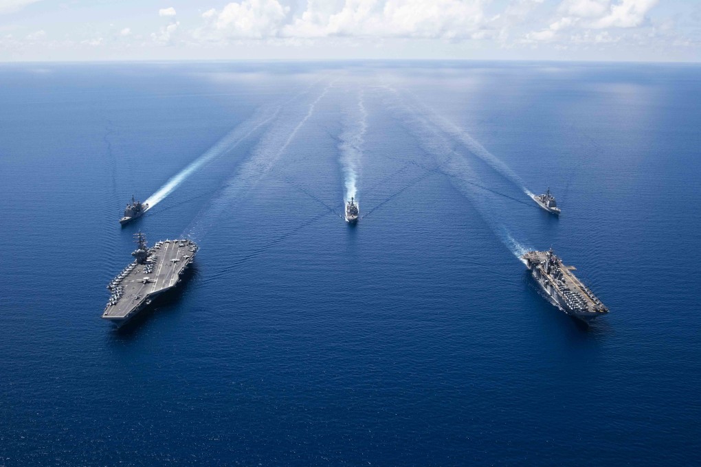 American aircraft carrier the USS Ronald Reagan and assault ships in the South China Sea. Photo: AFP