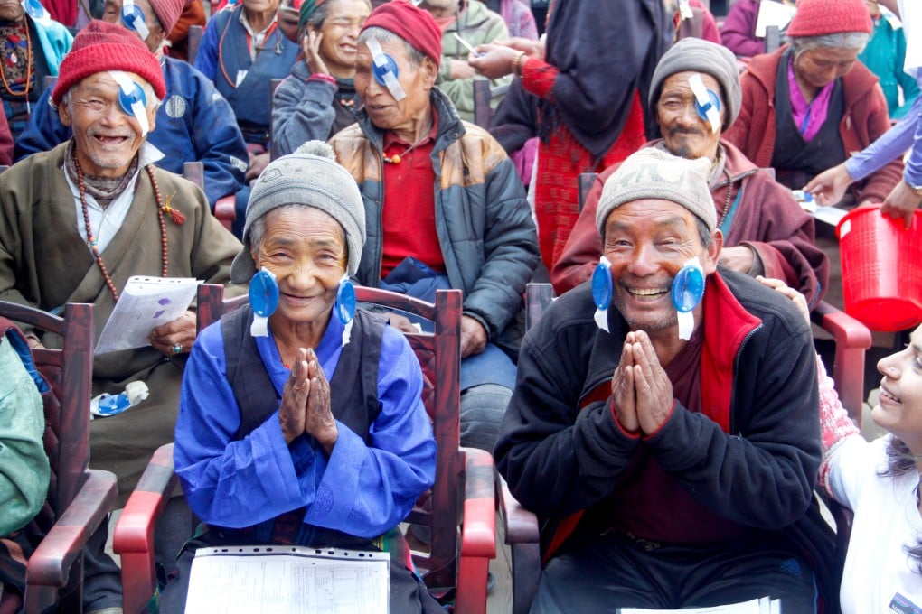 Villagers from Nepal’s Nubri Valley who can now see after being partially or completely blind for years thanks to free eye clinics set up as part of a language preservation project. Photo: Cathryn Donohue