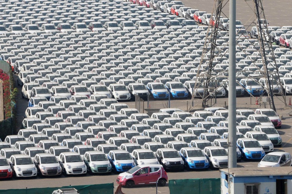 Maruti Suzuki Alto cars in a holding area at the Mundra Port and Special Economic Zone (MPSEZL) at Mundra near Ahmedabad in India on February 19, 2011. Photo: AFP