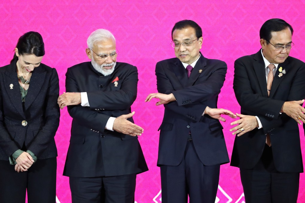 New Zealand’s Prime Minister Jacinda Ardern, Indian Prime Minister Narendra Modi, Chinese Premier Li Keqiang and Thai Prime Minister Prayuth Chan-ocha hold hands at the third Regional Comprehensive Economic Partnership summit in Bangkok, Thailand, on November 4. India later decided not to sign the pact. Photo: Reuters