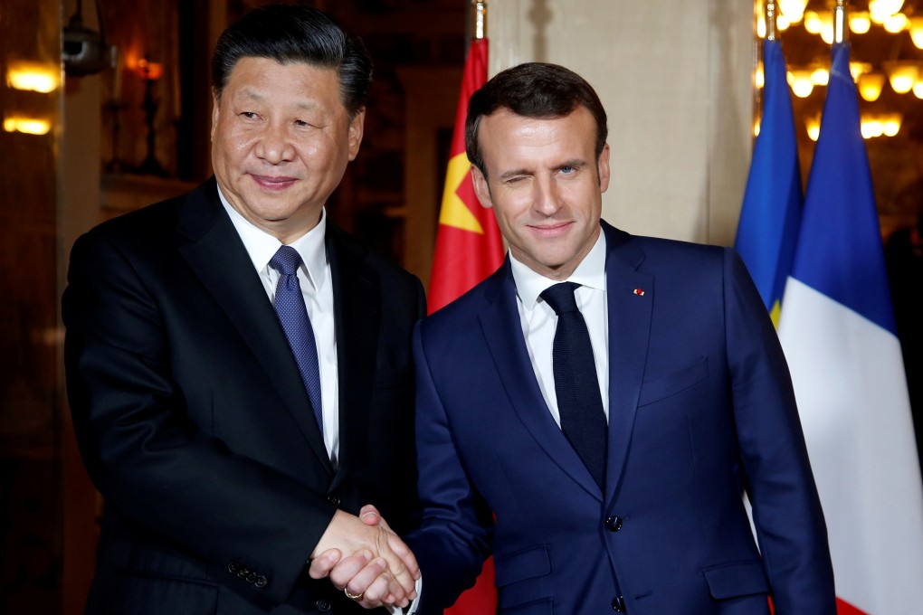 French President Emmanuel Macron shakes hands with Chinese President Xi Jinping as he arrives for a dinner at the Villa Kerylos in Beaulieu-sur-Mer, near Nice, France, on March 24. Photo: Reuters