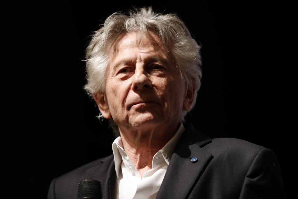 Director Roman Polanski stands on stage after the preview of his movie J'accuse (An Officer and a Spy) in Paris on Monday. Photo: AFP