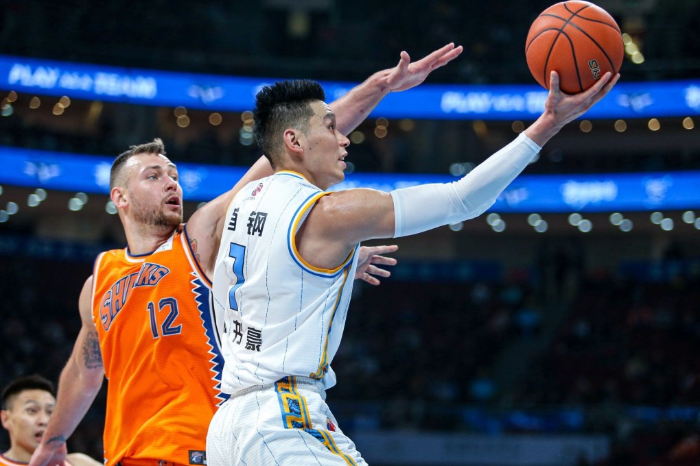 Jeremy Lin in action against the Shanghai Sharks in the Chinese Basketball Association. Photo: Sina Sports