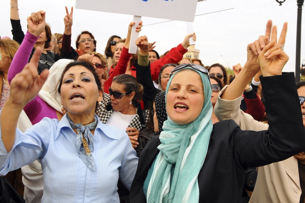 Tunisian women demonstrate for their rights during a protest in the capital of Tunis. Photo: AP