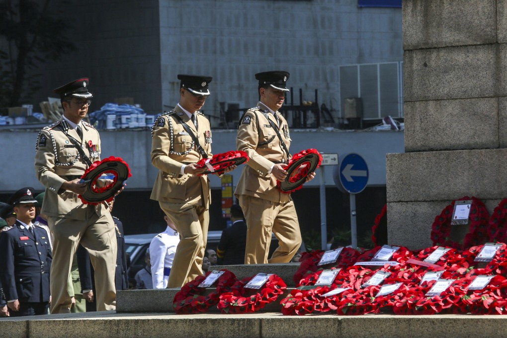 A Remembrance Day Ceremony to remember those who gave their lives in the defence of Hong Kong during the two world wars at The Cenotaph, Statue Square, Central. Photo: Jonathan Wong