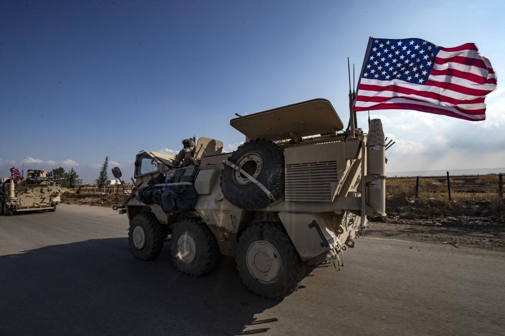 A convoy of US troops is pictured outside the Kurdish-majority city of Qamishli, in Syria’s northeastern Hasakeh province. Photo: AFP