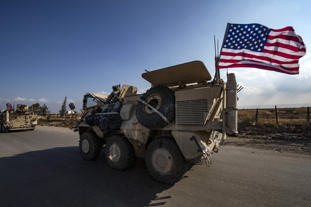 A convoy of US troops is pictured outside the Kurdish-majority city of Qamishli, in Syria’s northeastern Hasakeh province. Photo: AFP