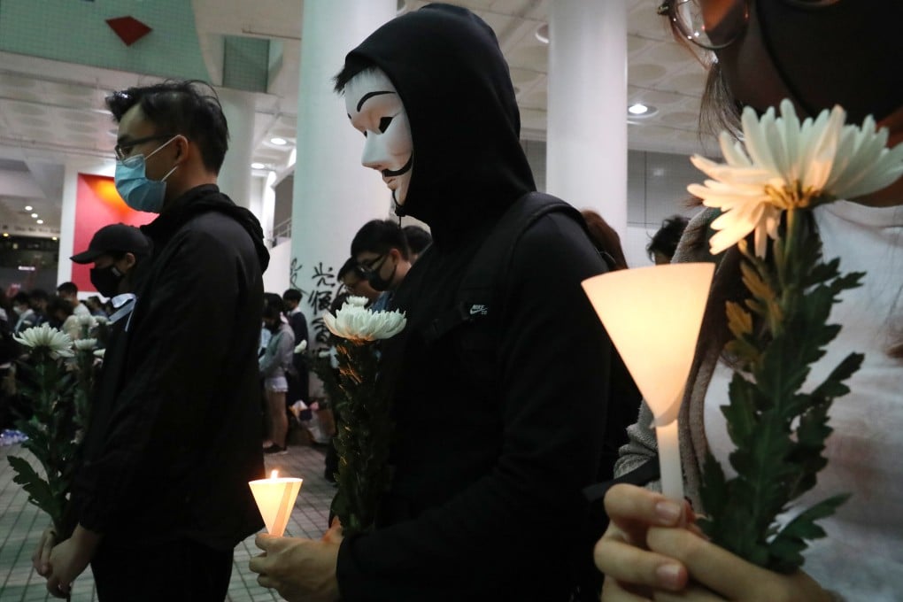 A vigil for Hong Kong student Chow Tsz-lok, who died after falling from a car park near a confrontation between police and protesters. A new group is hoping a peace-building forum can help to bring the city out of its current deadlock. Photo: Dickson Lee