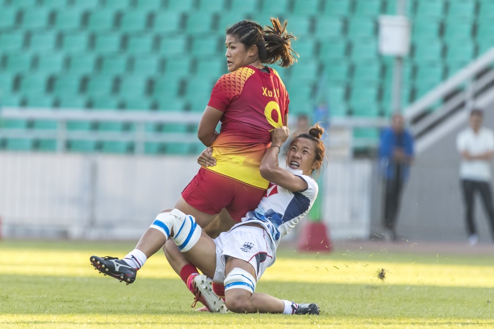 Chong Ka-yan takes down a Chinese player in the Olympic qualifying final. Photo: HKRU