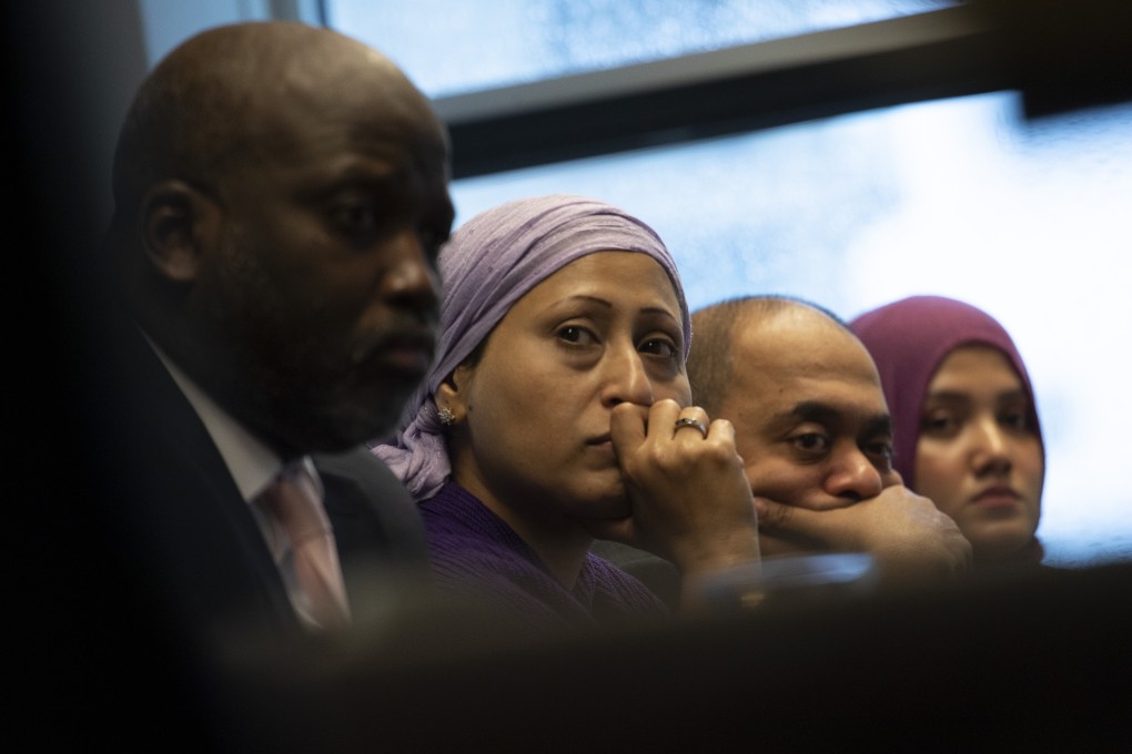 Representatives of the Rohingya community and Gambia's Justice Minister Aboubacarr Tambadou, left, listen to a testimony during a press conference in The Hague. Photo: AP Photo