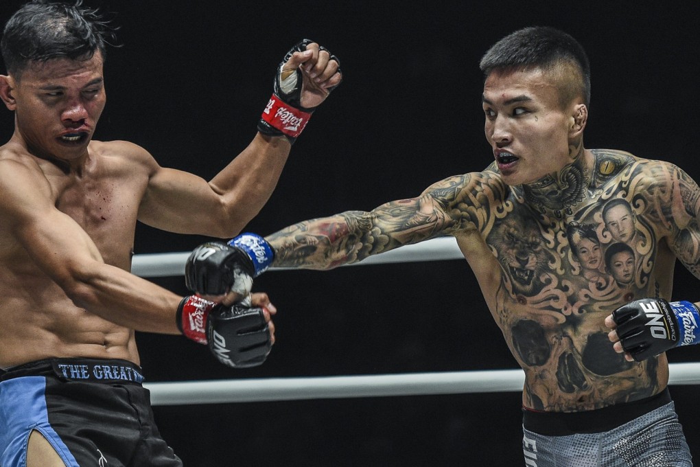 Li Kai Wen punches Paul Lumihi at Masters of Fate in Manila. Photos: One Championship