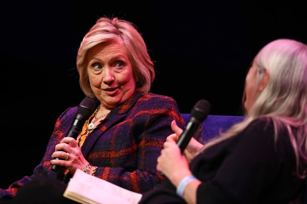 Former US Secretary of State Hillary Clinton (left) speaks at her book launch in London on Sunday. Photo: PA via dpa