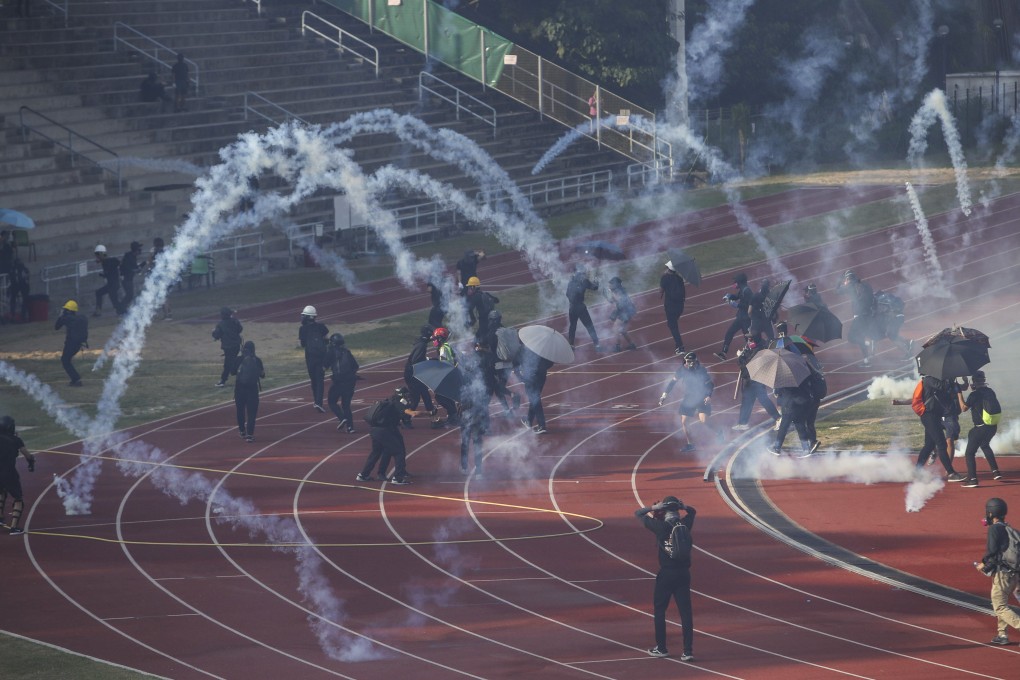 Clashes erupt on Tuesday between anti-government protesters and riot police on the campus of Chinese University. Photo: Winson Wong