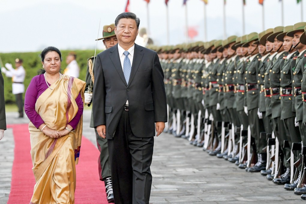 Chinese President Xi Jinping, with Nepali President Bidya Devi Bhandari, reviews a guard of honour during a welcome ceremony in Kathmandu on October 12, 2019. Photo: Xinhua