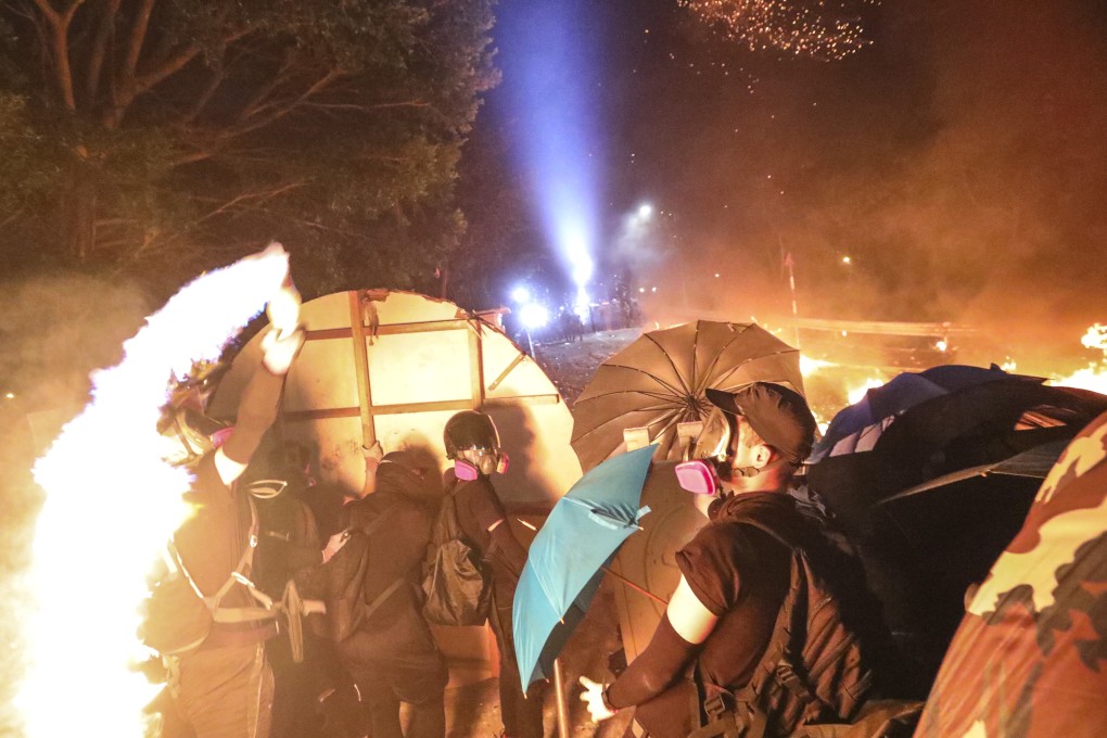 Clashes between riot police and students at Chinese University of Hong Kong in Sha Tin. Photo: Felix Wong
