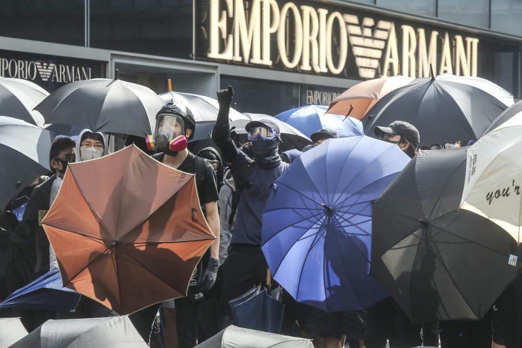 Protesters hold a lunchtime rally in Central, Hong Kong’s financial heart, on November 12. Photo: K. Y. Cheng
