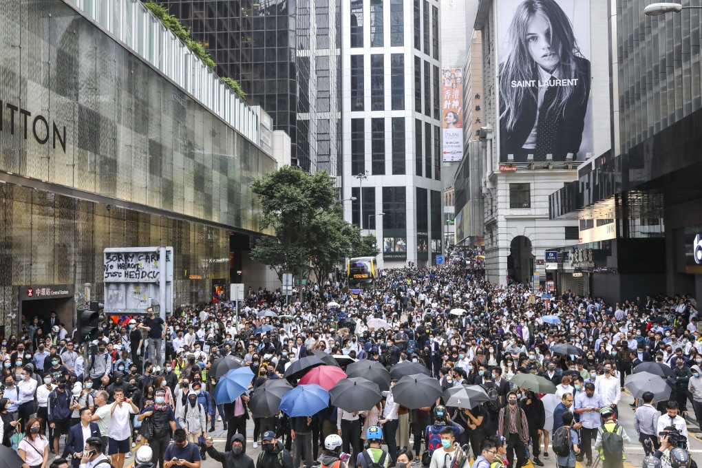 Protesters flood Pedder Street during a lunchtime rally in Central. Photo: K.Y. Cheng