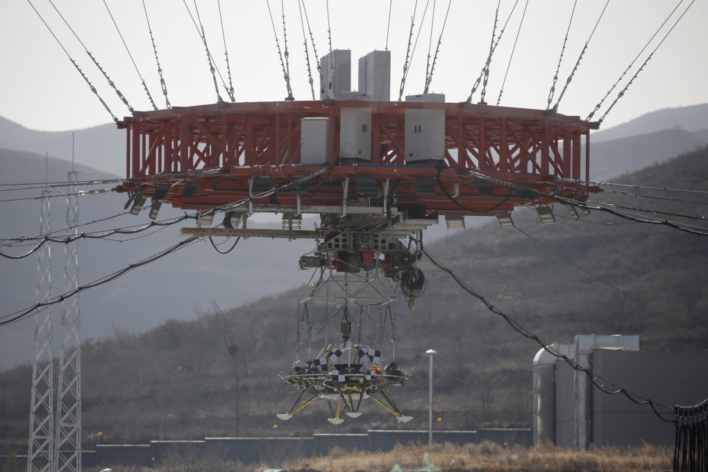 The lander carries out a hovering-and-obstacle avoidance test in Huailai, Hebei province. Photo: Reuters