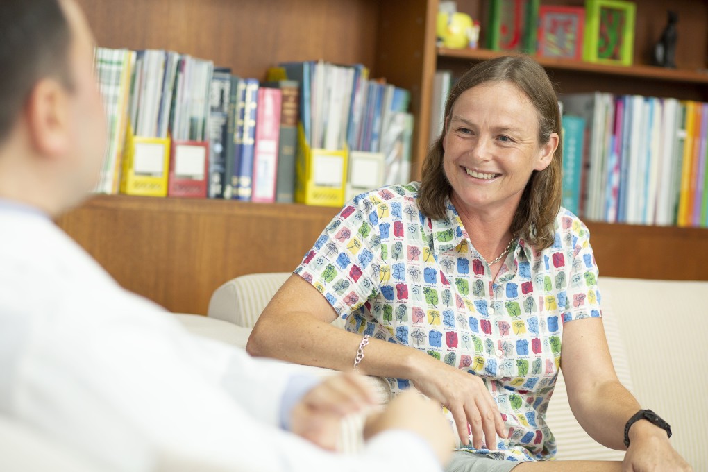 Mary Henderson, a former member of Hong Kong women’s cricket team, chats with Dr Francis Lam an orthopaedic surgeon at Hong Kong Adventist Hospital – Stubbs Road, in Happy Valley, after successful surgery on her injured shoulder. Photo: Frank Freeman