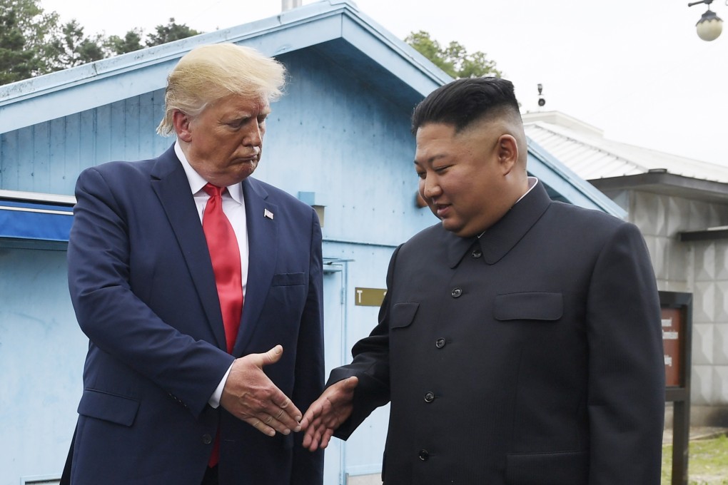 US President Donald Trump shakes hands with North Korean leader Kim Jong-un in June. Photo: AP