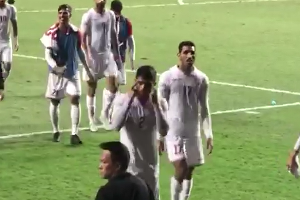 Bahrain’s Sayed Baqer appears to aim a racist gesture at Hong Kong supporters after a fractious ending the their World Cup qualifying match. Photo: Twitter/@pjrydo