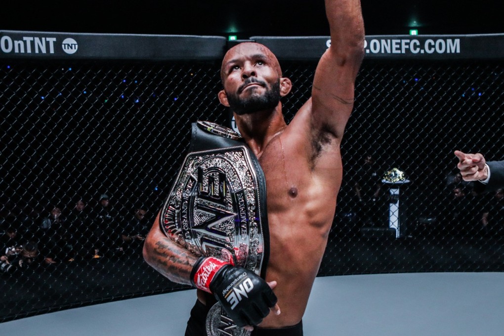 Demetrious Johnson celebrates winning the One flyweight grand prix. Photo: One Championship