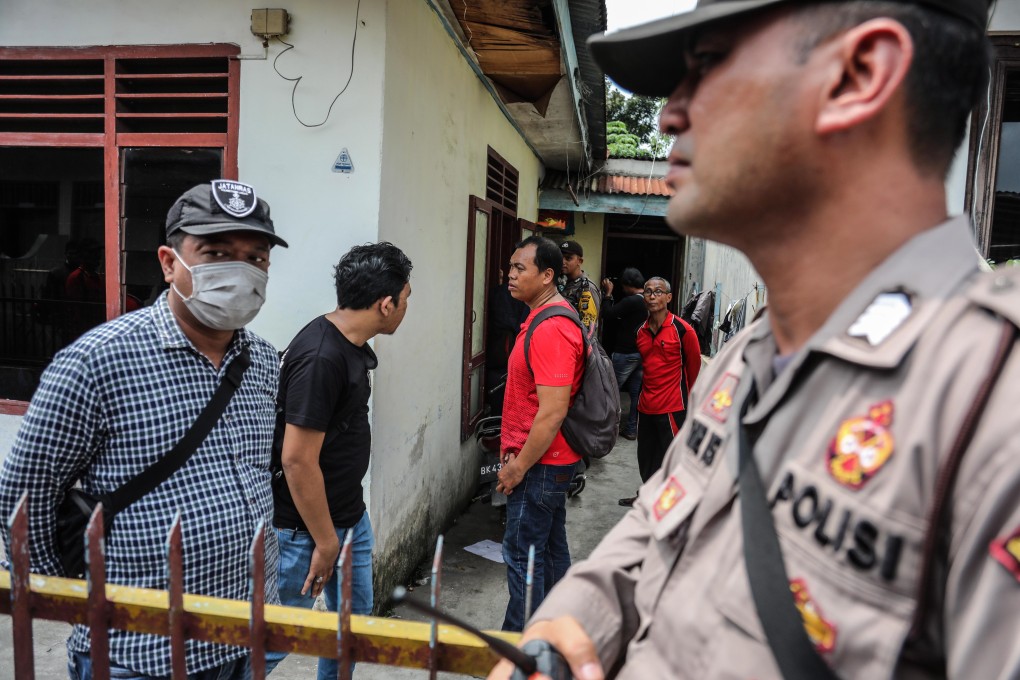Police inspect a house after a suicide bombing in Medan city on November 13, 2019. Photo: EPA-EFE