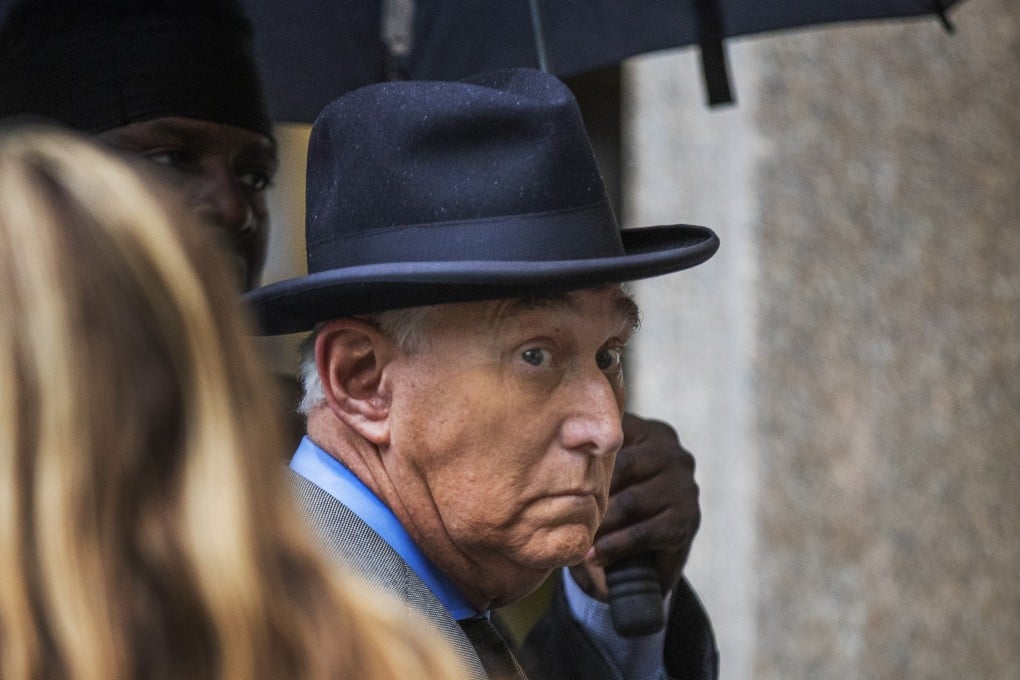 Long-time Trump adviser Roger Stone waits in line at the federal court in Washington on Tuesday. Photo: AP