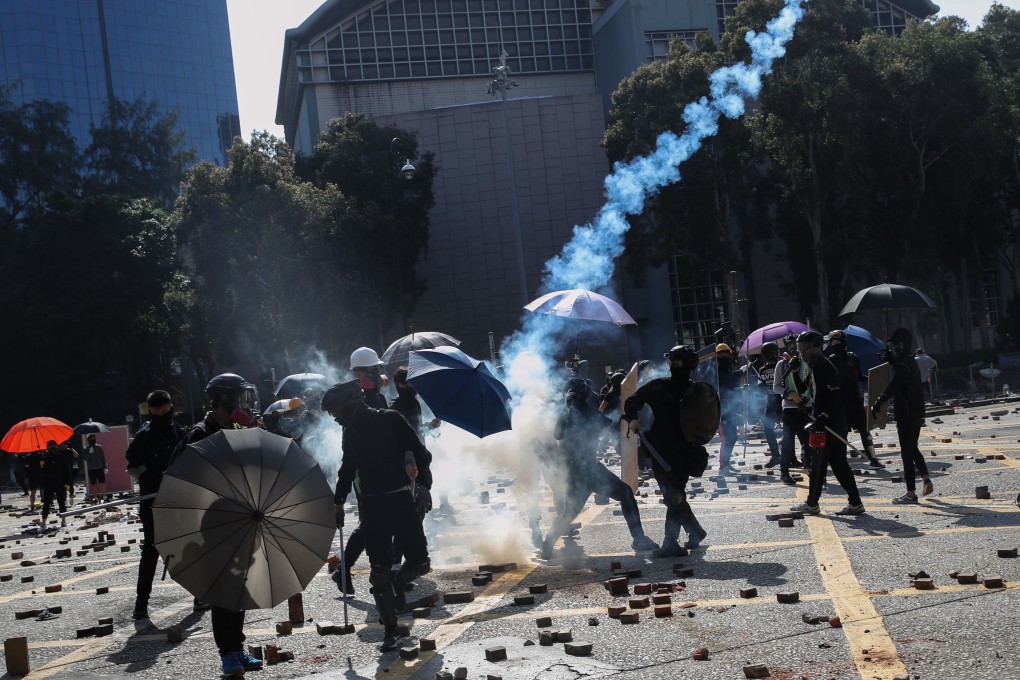 Police fired tear gas near the junction of Austin Road and Chatham Road South outside Polytechnic University. Photo: Winson Wong