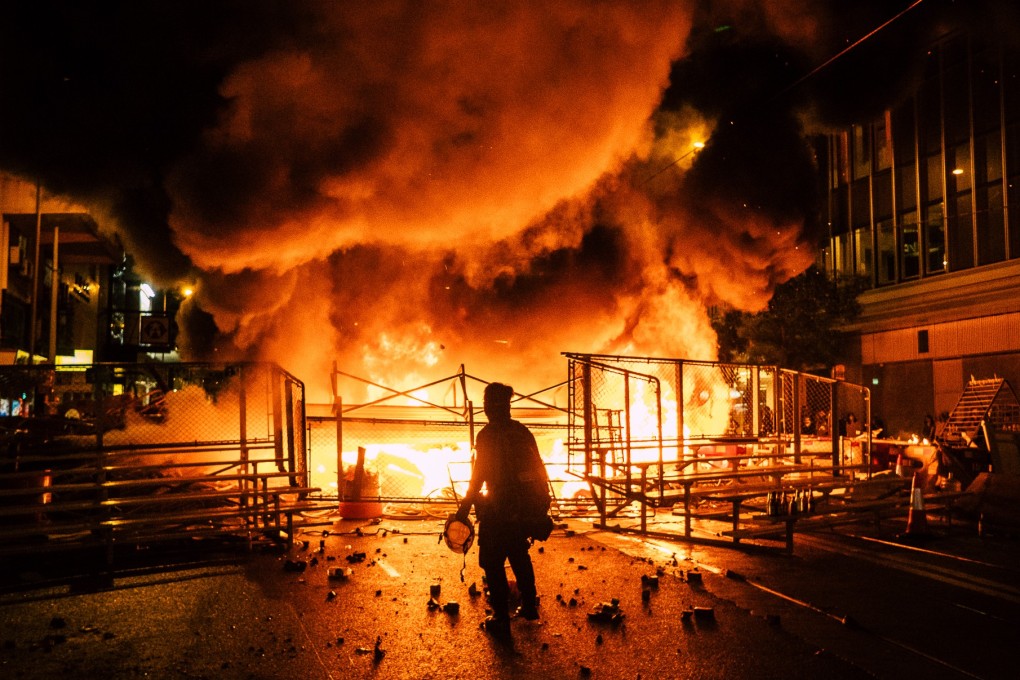 Some church workers are appearing regularly at the protest front lines to be a buffer between police and demonstrators. Photo: Yeung Kwan