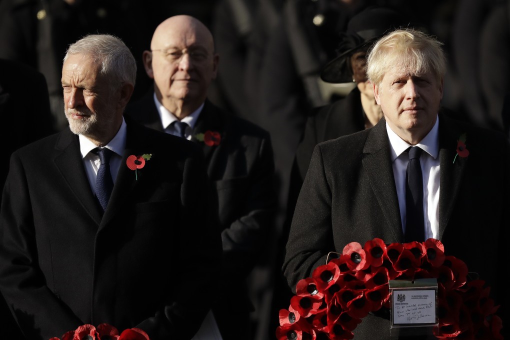 British Prime Minister Boris Johnson (right) and leader of the Labour Party Jeremy Corbyn prepare to lay wreaths during the Remembrance Sunday ceremony at the Cenotaph in Whitehall in London on November 10. Photo: AP