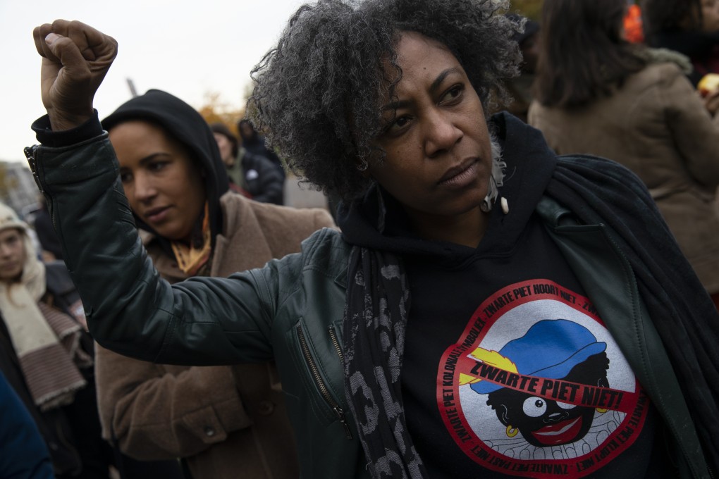 Demonstrators gather for a Kick Out Black Pete rally in The Hague, Netherlands, on November 16, 2019. Photo: AP