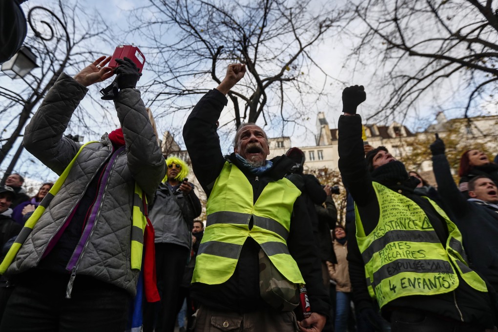 Yellow Vests protesters gather in central Paris to mark the one year anniversary of the protest movement. Photo: EPA-EFE
