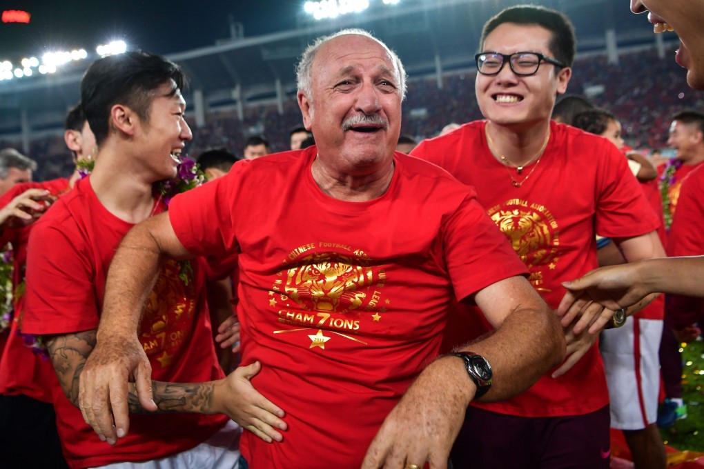Guangzhou Evergrande coach Luiz Felipe Scolari (centre) celebrates after winning the Chinese Super League in 2017. Photo: AFP