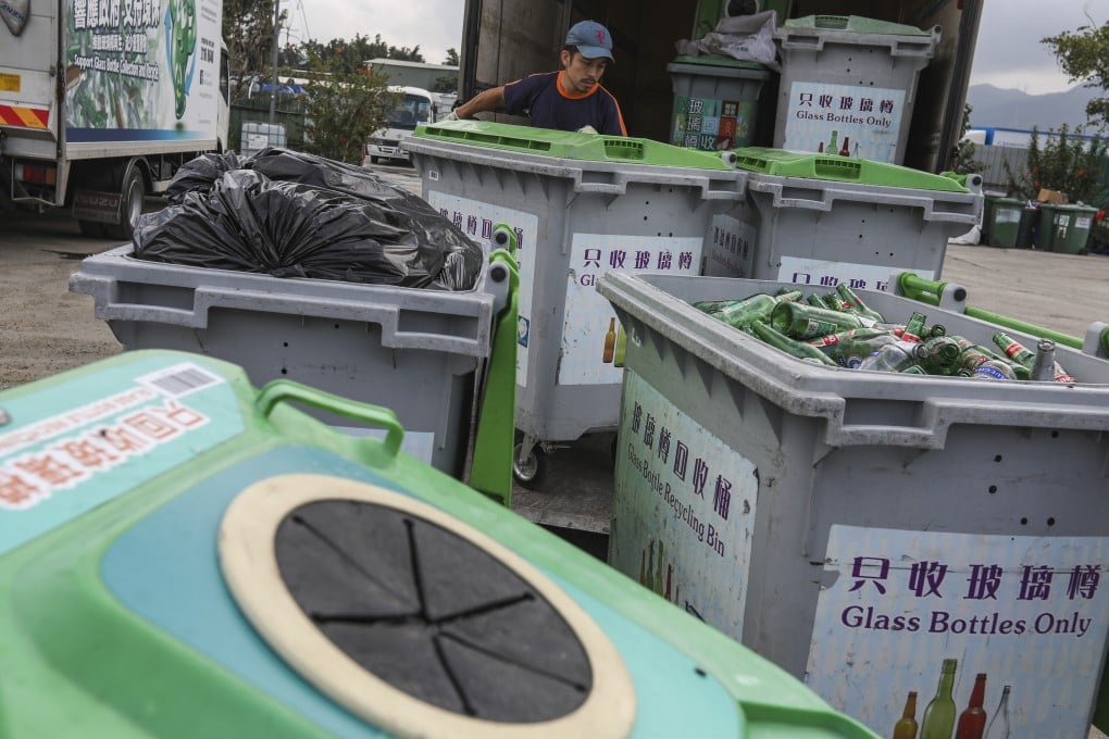 Glass bottle recycling bins in Yuen Long. Photo: Nora Tam