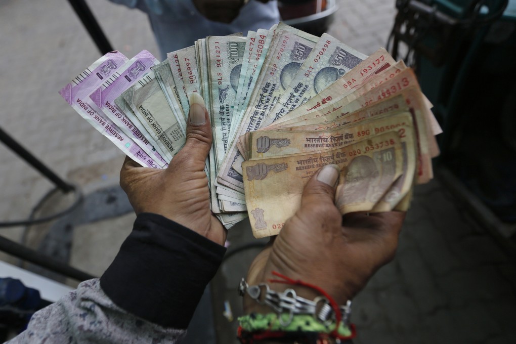 Two poorly conceived policy initiatives – a bungled goods and service tax and demonetisation – affected small-town India. Photo: AP