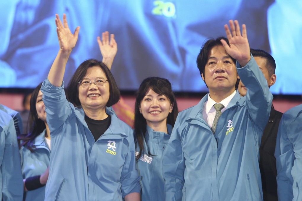 Taiwanese President Tsai Ing-wen (left) waves to supporters while launching her re-election campaign in Taipei on Sunday. Photo: AP