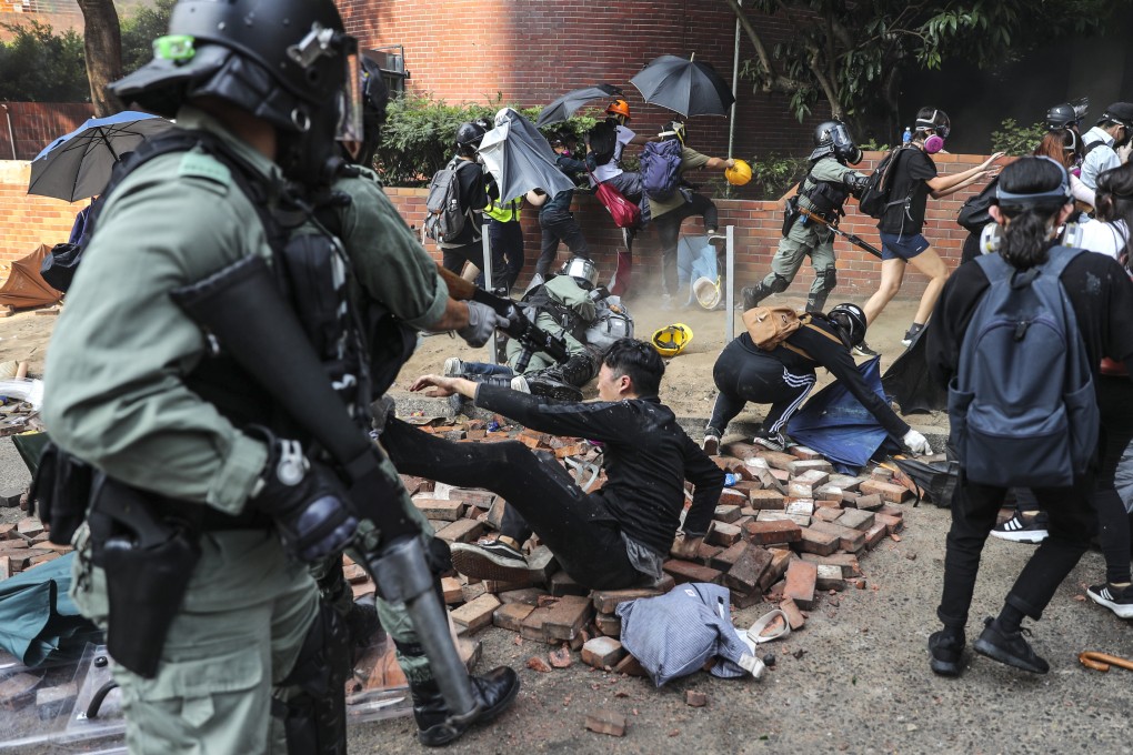 Police made mass arrests on Monday but about 100 radicals were still barricaded inside Polytechnic University in Hung Hom on Tuesday morning. Photo: Sam Tsang