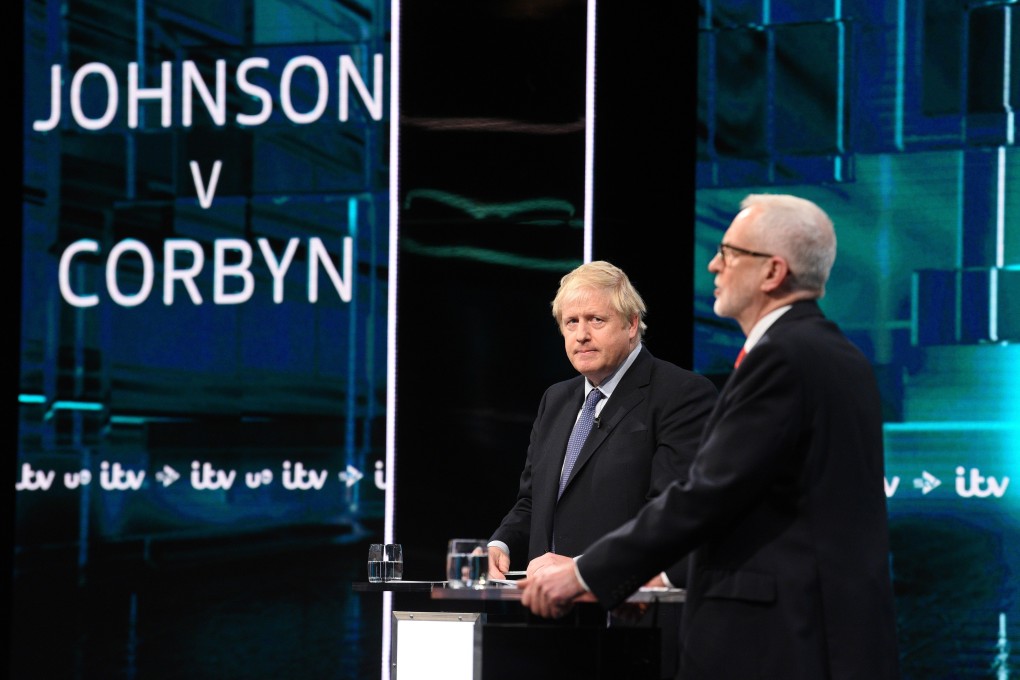British Prime Minister Boris Johnson and Labour Party leader Jeremy Corbyn during the live debate. Photo: Handout via EPA-EFE