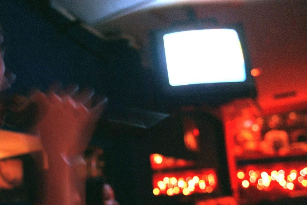 The girl’s father said she had been tricked into working at a karaoke bar. Photo: AFP