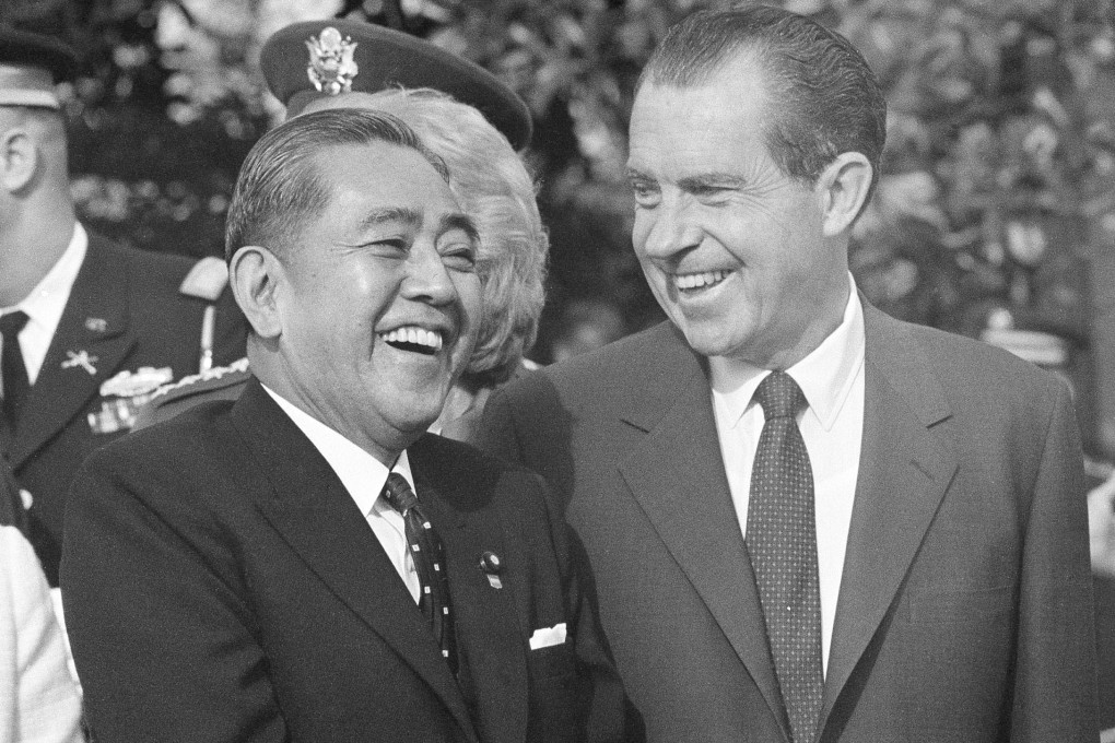 Former US president Richard Nixon welcomes then Japanese prime minister Eisaku Sato to the White House in 1969. Photo: AP